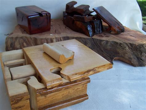 A personalisation option could include your team's picture, brand name and logo and a lot more according to your requirement. Handmade Puzzle Boxes by Wolf Creek Woodworks | CustomMade.com