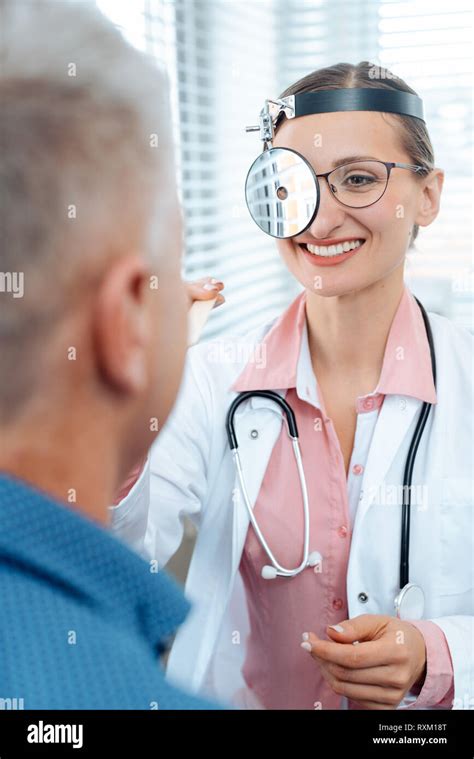 Ent Doctor Examining Patient Stock Photo Alamy