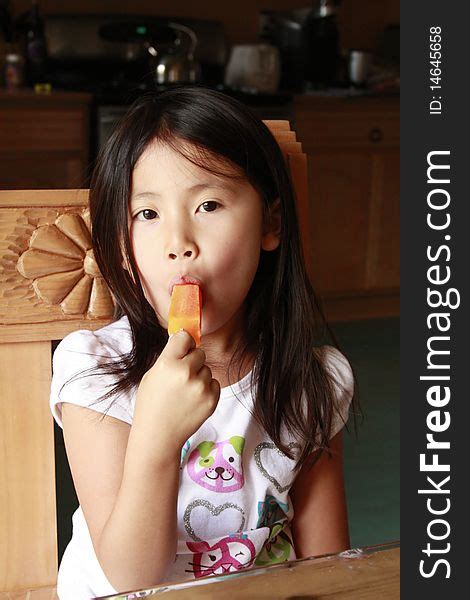 Asian Girl Eating Ice Pop Free Stock Images And Photos 14645658