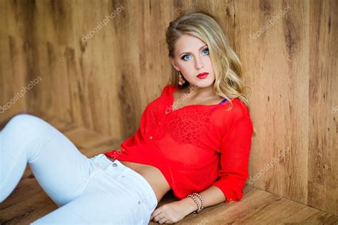 Beautiful Sexy Blonde Girl In A Red Blouse Lying On The Floor — Stock