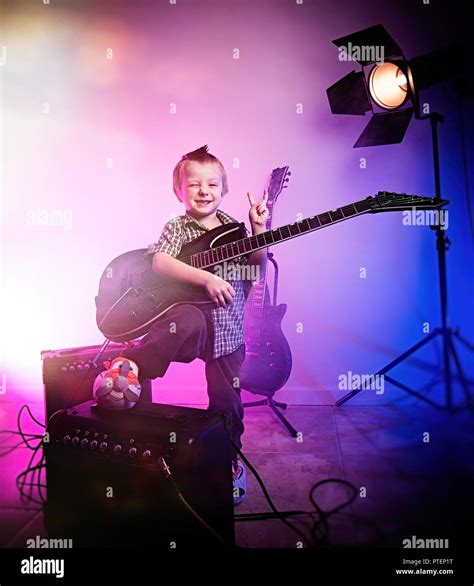 Boy Playing Guitar Kid Guitarist Stock Photo Alamy