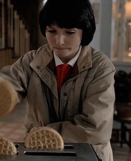 | michael mike wheeler (portrayed by finn wolfhard) is the son of karen and ted, younger brother of nancy and older brother of holly, and is friends with lucas. Michael "Mike" Wheeler | Wiki | Stranger Things Amino