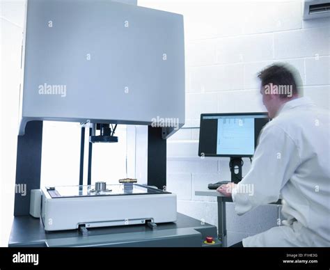 Engineer Measuring Parts In Quality Control Room Stock Photo Alamy