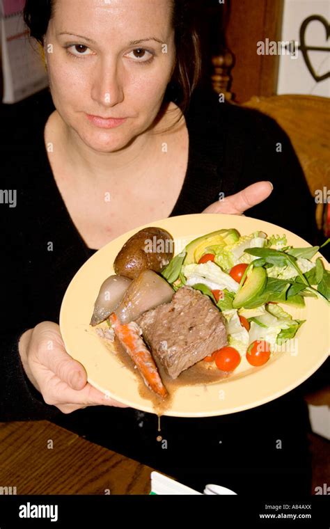 Woman Age 39 Displaying Her Roast Beef Dinner With All The Trimmings