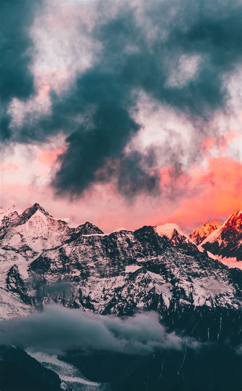 Download Wallpaper 950x1534 Clouds Sunset Glowing Peaks Mountains