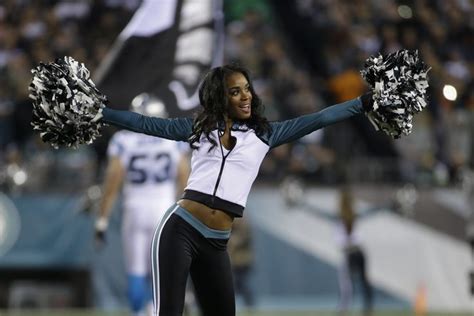 A Philadelphia Eagles Cheerleader Performs During The First Half Of An