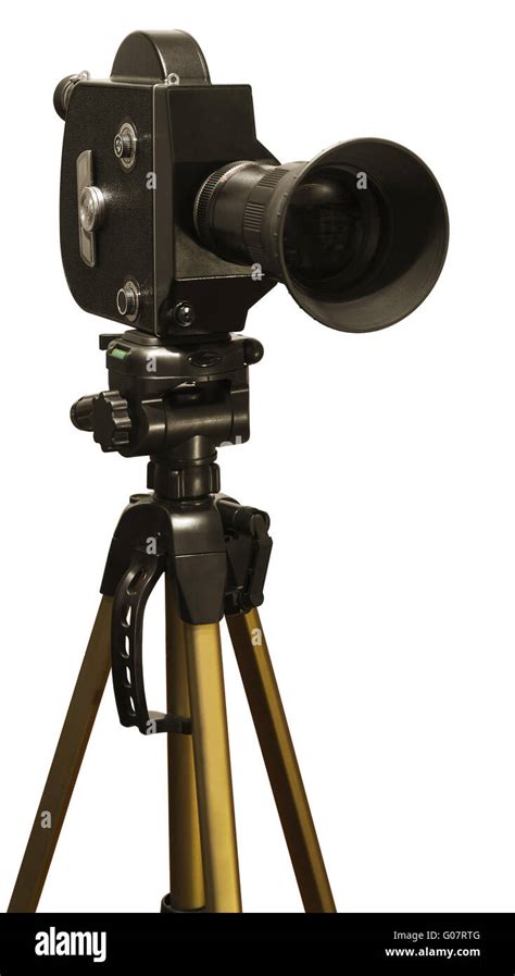Old Fashioned Movie Camera On A Tripod Close Up Isolated On A White