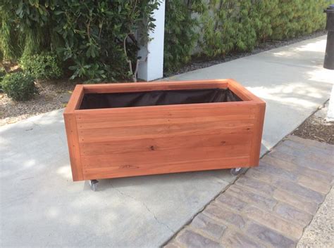 So you want to build a raised garden bed, do you? Curtis Custom Planters | Beautiful Handmade Custom Redwood Planters