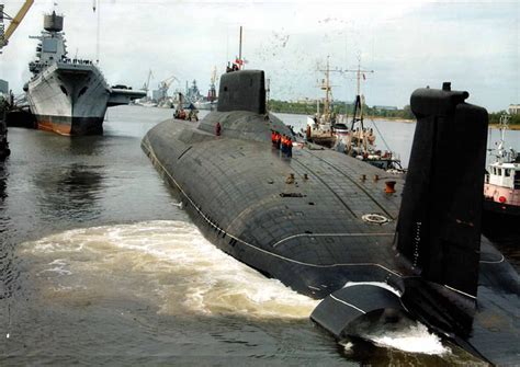 Russian Typhoon Class Submarine Being Towed Aircraft Carrier Kuznetsov Berthed Nearby [1739 ×