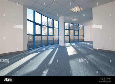 Bright Sunlit Empty Office Space With Sunlight Streaming Through