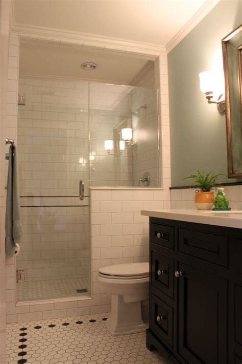 The white toilet, sink, and subway wall tiles contrast with them nicely. A Simple Solution to Adding a Basement Bathroom - KnockOffDecor.com