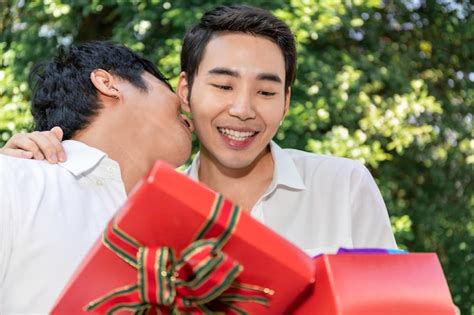 Premium Photo Sweet Moment Of Love Portrait Of Asian Homosexual Couple Hug And Surprise Box