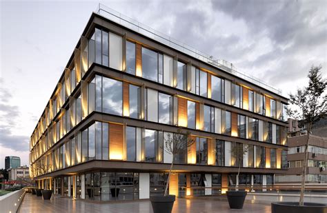 Muum Designed Office Building Is A Quiet Oasis In The