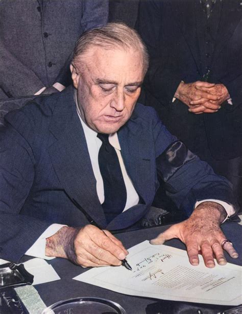 President Franklin D Roosevelt Signing The Declaration Of War Against