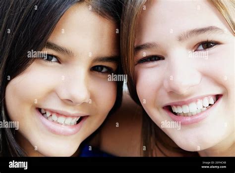 Portrait Of Two Girls Smiling Stock Photo Alamy