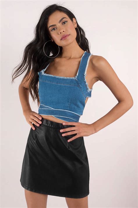 During the warmer months, opt for tube crop tops, off the shoulder crop tops, and graphic crop tops to relish in that summer sun. Harper Wrap Crop Top in Denim - $50 | Tobi US