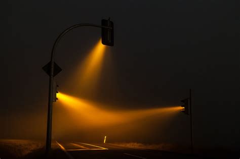Dramatic Photos Of Traffic Lights On A Foggy Night By