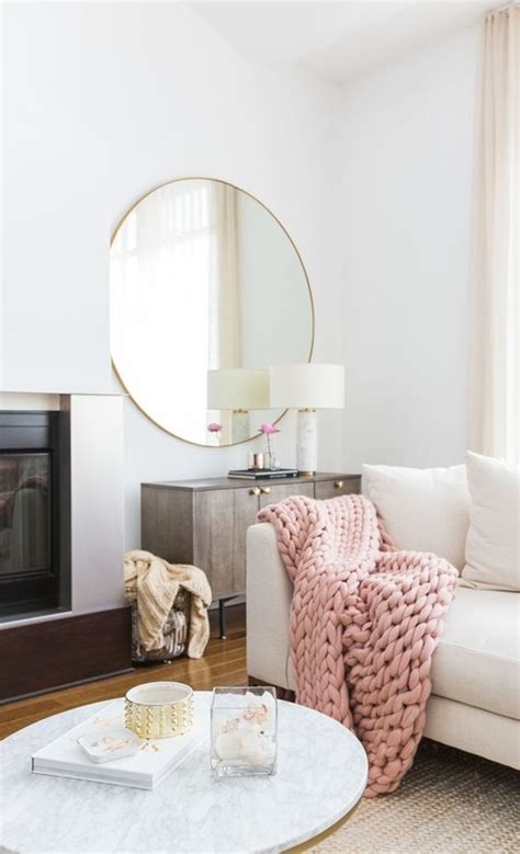 Go for roundel mirrors of various sizes. Need help finding large round mirror for my living room!