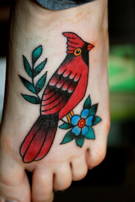 The popularity of ankle tattoos was increased by professionals and day time. red bird | Cardinal tattoos, Body art tattoos, Tattoos