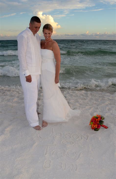 Beach Wedding Bride And Groom Wearing A Debra Torres