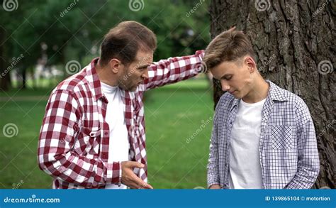 Dad Scolding His Son For Bad Behavior Education Process Fathers And