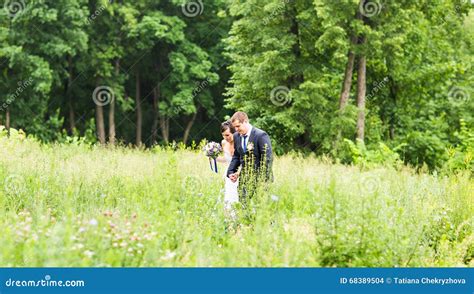 Happy Bride And Groom On Their Wedding Day Stock Photo Image Of