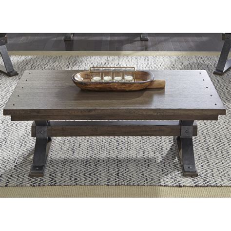 Distinctively designed, this piece features a wide body with a curved lower panel, while a trestle base provides stylish support. Gracie Oaks Pyburn Trestle Coffee Table & Reviews | Wayfair