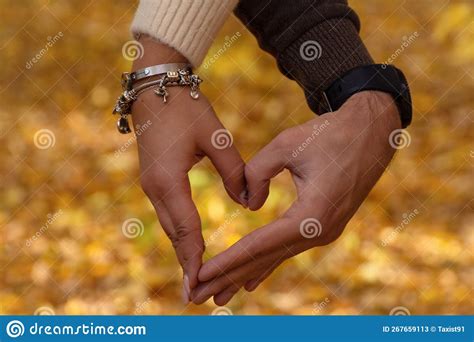 A Couple In Love Shows A Heart With Their Hands Stock Image Image Of