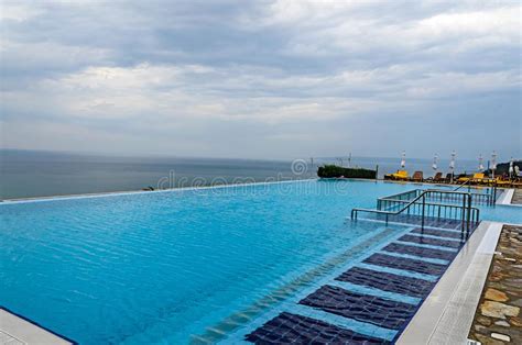 Infinity Pool With Crystal Blue Water View To Sea Ocean Stock Image