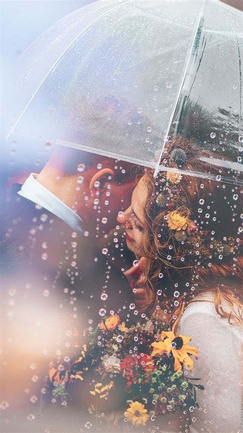 1080x1920 Married Couple Romantic Umbrella Raining Weeding