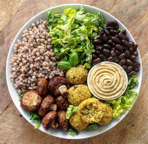 Indian saffron, turmeric root, indian yellow root, curcuma, curcuma aromatica, curcuma domestica. Dinner bowl loaded with buckwheat groats, black beans ...