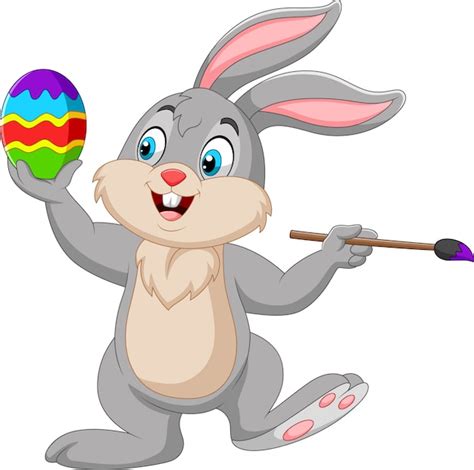 Pequeño Conejo De Dibujos Animados Con Huevo De Pascua En La Hierba