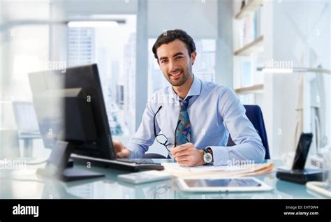 Man Sitting Office Desk Bildbanksfoton Och Bilder Getty Images Photos