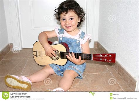 Little Girl Playing Guitar Stock Photo Image 6486470