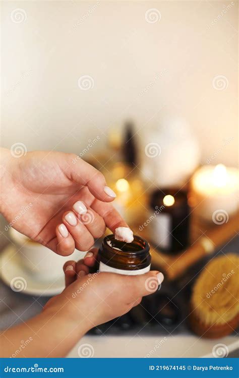 Female Cosmetologist Applying Facial Cream In Salon Stock Image Image