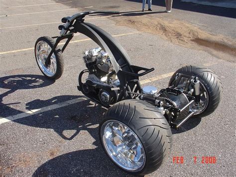The Motorcycle Is Parked In The Parking Lot With Its Wheels On Its Side
