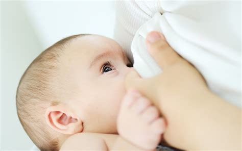 Breastfeeding: hand expressing breast milk