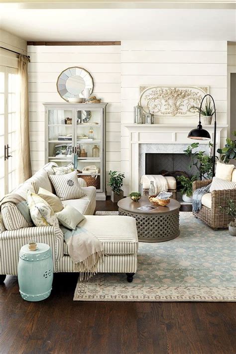 The tufted upholstery of the recliner adds real value to the living room. 70 French Country Decorating Ideas for Living Rooms 2021 - nickyholender.com