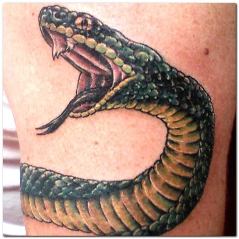 Tattoos Designs New Snake Tattoos Designs 2012