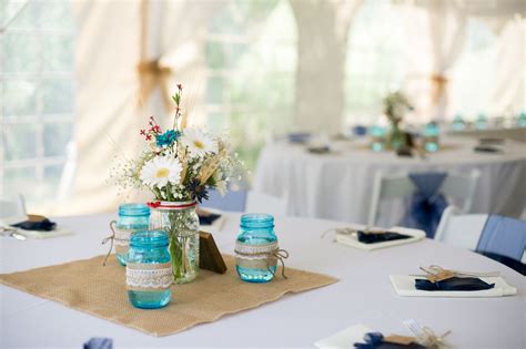 Blue Mason Jar And White Gerbera Daisy Centerpieces