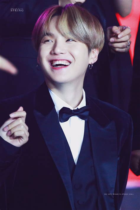 Here Are 10 Photos Of BTSs Suga Dazzling You With His Adorable Smile