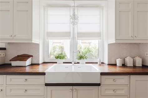 Cabinet hardware can also add to the cost: Kitchen Cabinet Refacing Cost - Surdus Remodeling