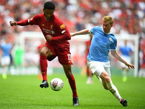 Manchester city will host liverpool at the etihad stadium on sunday in a meeting of the premier league's two most dominant teams in recent years. Liverpool vs Man City: We're stuck between a rock and a hard place