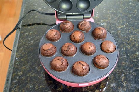 Cake pops have a delightfully crisp outer shell of candy coating, yet inside is a delicious combination of cake and frosting. Chocolate Covered Christmas Cake Balls {cake ball}