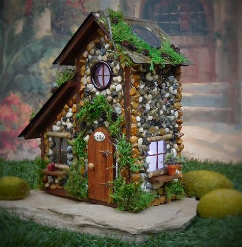 Check out our solar fairy with color changing solar globe, or our fairy solar statue h olding a bunny. Fairy House with Solar Lights/ Fairy Cottage/ by ...