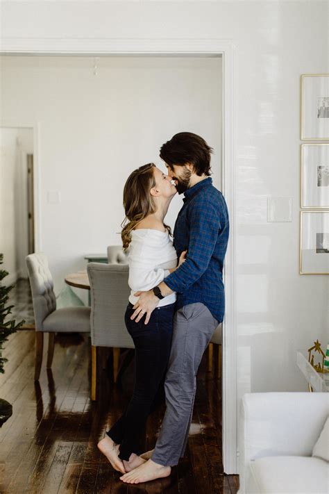 Couple Kissing In Home Engagements Inside Lifestyle Photography In Home