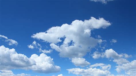 Summer Clouds Fly Across A Royal Blue Sky Hd 1080p