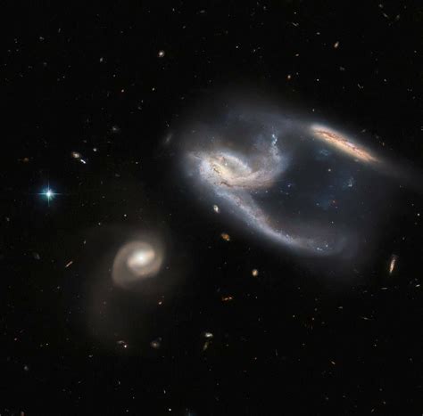 Nasas Hubble Delivers Stunning View Of Three Galaxies In A Single