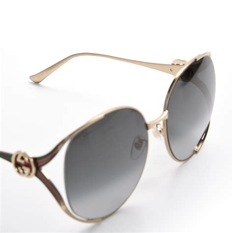 gucci oversized round frame gg0225s sunglasses gold 598587