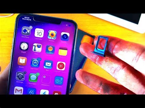 Put the sim ejection tool into the hole, or your preferred alternative, into the pinhole opening. How To Insert SIM in iPhone 11, 11 Pro & 11 Pro Max ...